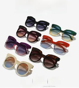Detailed grid showing oversized rhinestone sunglasses in multiple vibrant fashion colors