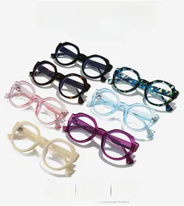 Detailed top view of retro round frame sunglasses in seven assorted vibrant colors