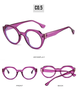 Detail view of round purple translucent frames with gold metal hinges and sleek temples