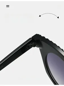 Detail showing the durable texture hinge and smooth black frame of the sunglasses