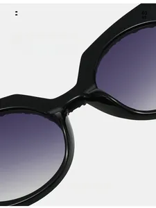 Detail of comfortable nose pads on black thick frame sunglasses with gradient lenses