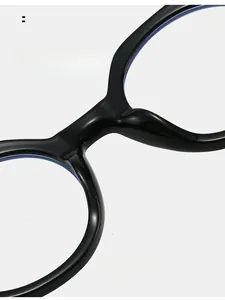 Macro view of seamless ergonomic nose pads on glossy black fashion sunglasses
