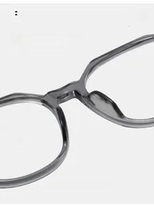 Detail of comfortable nose pads on gray translucent square anti-blue light glasses