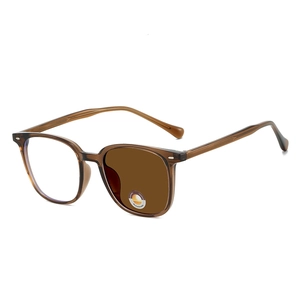 Retro photochromic sunglasses with transparent brown frame showing lens transition
