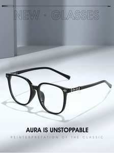 Detail of retro oversized black frames with silver engraved metal hinge decorations