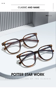 Detail of tortoise shell TR90 frames with decorative metal cross hinge on white stands