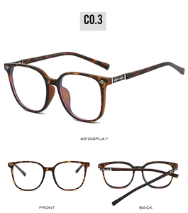 Detail view of tortoiseshell square glasses frame with silver temple patterns