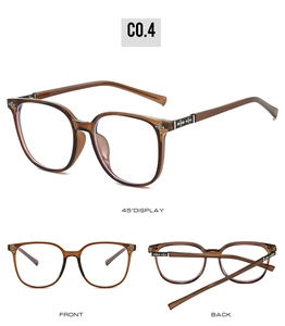 Detail view of tea-brown square glasses frames with metal cross pattern on the temples