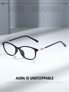 Detail of black full-rim eyewear frame featuring elegant gold hollowed metal hinge accents