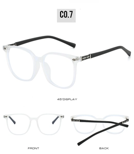Detailed views of vintage oversized glasses frames with intricate metal cross hinge accents
