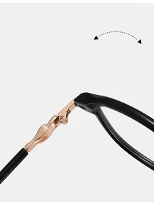 Detailed close-up of durable rose gold metal hinge on sleek black glasses frame