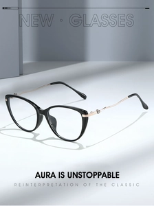 Detailed side view of cat-eye frames with elegant golden wave-patterned metal temples