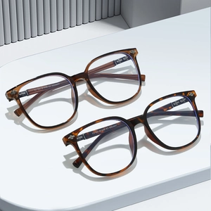 Retro large frame anti-blue light glasses with tortoiseshell pattern and silver cross detail