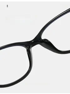 Detail of comfortable integrated nose pads on stylish black cat eye glasses