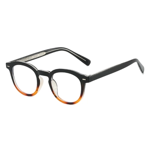 Retro round glasses frame in black and tortoiseshell finish with blue light blocking lenses