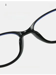 Detail of comfortable integrated nose pads on black matte round frame glasses