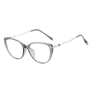 Fashion cat-eye glasses frame with transparent grey finish and wavy silver metal temples