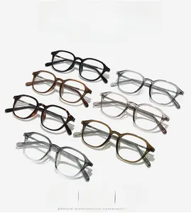 Detailed view of various colors of vintage round glasses frames with metal hinges