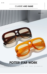 Detail view of retro oversized double-bridge sunglasses with tortoiseshell and orange frames