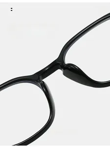 Close-up of integrated comfortable nose pads on black glasses frame for long-term wear