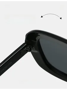 Macro view of durable metal hinge and 51-22-138 size specs on black double-bridge sunglasses