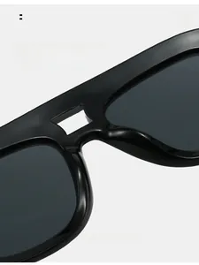 Close-up of comfortable integrated nose pads on black thick frame sunglasses