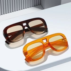 Oversized double-bridge sunglasses in tortoiseshell and orange with gradient lenses