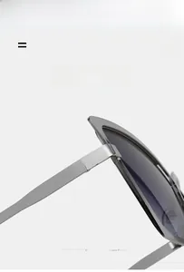 Détail de charnière métallique sur lunettes de soleil avec monture argentée légère