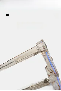 Macro detail of TR90 glasses frame showing reinforced metal core and elastic hinge