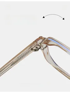 Close-up of durable metal hinges on transparent TR90 aviator glasses frames