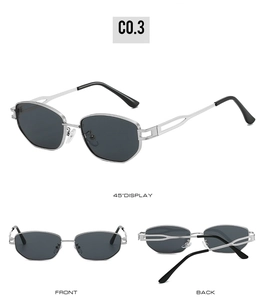 Lunettes de soleil polygonales en métal argenté avec branches ajourées et verres gris