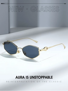 Detailed view of gold metal sunglasses with geometric frames and gray-blue lenses