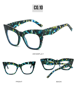 Detail view of square sunglasses with colorful blue and yellow marble patterned wide temples