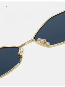 Detail of comfortable silicone nose pads on gold polygon sunglasses for long-term wear