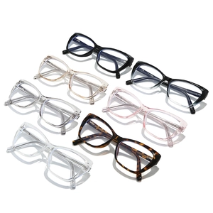 Cat-eye blue light blocking glasses frames in seven diverse colors on white background