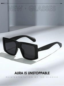 Detail of matte black square sunglasses with metallic dots and sharp side shadows