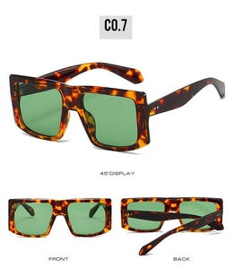Three angles of tortoise frame sunglasses with dark green lenses and metal details