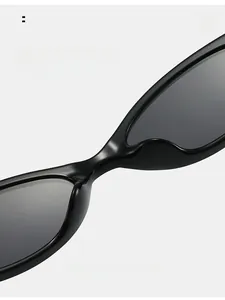 Detail shot of integrated comfortable nose pads on black fashion oversized sunglasses