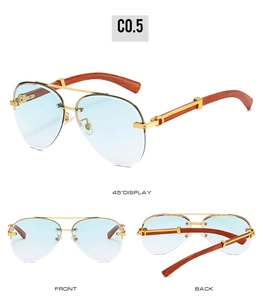 Macro view of pilot sunglasses with wood grain temples and blue gradient lenses