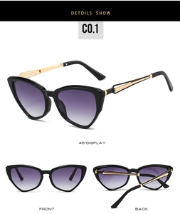 Cat eye sunglasses with black frames, purple gradient lenses and gold metal temples