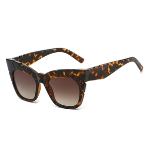 Trendy square frame sunglasses in tortoise pattern with wide temples and UV protection