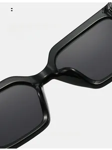 Close-up of ergonomic integrated nose pads on large black square fashion sunglasses