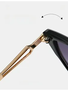 Macro shot of durable metal hinges on black cat-eye sunglasses with gold hollow temples