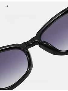 Detail view of comfortable nose pads and purple gradient lenses on cat-eye sunglasses