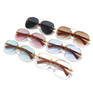 Retro pilot sunglasses with wood grain temples and metal frames in multiple colors