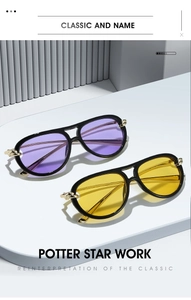 Detail of aviator sunglasses with gold chain temples and purple and yellow lenses