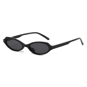 Retro black oval sunglasses with glossy frames for a trendy street style fashion look