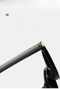 Detail of high-elastic black sunglasses frame with premium gold metal hinge accents