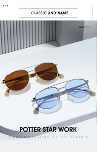 Détail des lunettes aviateur à double pont avec montures en métal doré et argenté
