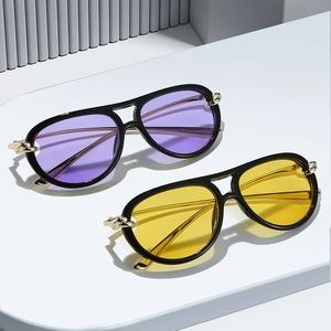 Stylish oversized aviator sunglasses with purple and yellow lenses and gold chain detail